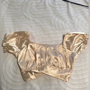 NWOT Champagne gold satin crop with tie-back closure.